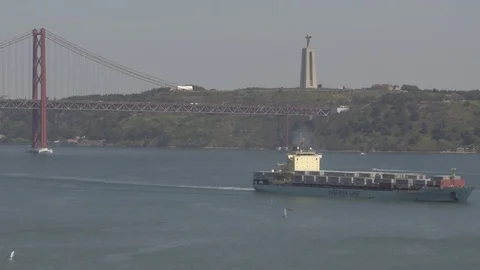 Cargo Ship leaving Lisbon (2017) Video stock 77196465