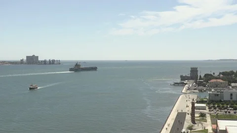 Cargo Ship leaving Lisbon (2017) Video stock 120057894