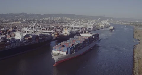 Cargo Ship Leaving Port Stock Footage 99869533