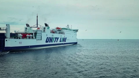 Cargo ship leaving the Port Stock Footage 124319673