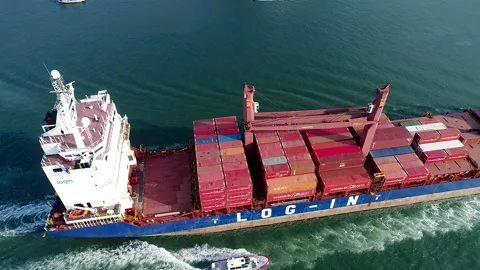 Cargo ship leaving the Port Stock Footage 153412634
