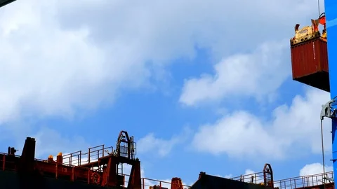 Cargo ship load at port 4k intro video for business Stock Footage 96323174