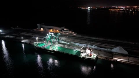 Cargo Ship Loading Bulk Materials at Industrial Port at Night Stock Footage 346652306