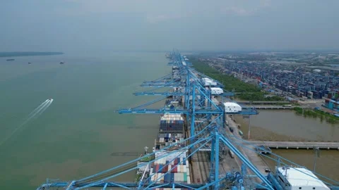 Cargo ship loading containers, North Port Klang. Best aerial view drone Stock Footage 344603611