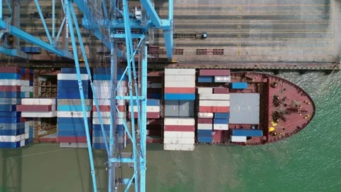 Cargo ship loading containers, North Port Klang. Great aerial view drone Stock Footage 344610231