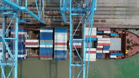 Cargo ship loading containers, North Port Klang. Magic aerial view drone Stock Footage 344612427