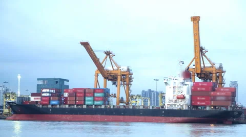 Cargo ship loading goods container at shipping port Stock Footage 60124821