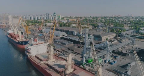 Cargo ship loading in seaport, aerial view Stock Footage 117616822