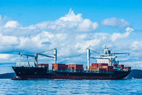 Cargo Ship Making Way Stock Photos