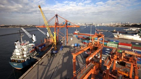 Cargo ship moving load at port (Time lapse) Stock Footage 104893993