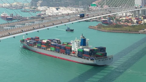 Cargo Ship Navigating Near Stonecutters Bridge, Revealing Hong Kongs Vibrant Stock Footage 319061783
