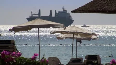 Cargo ship near the beach Stock Footage 10818833