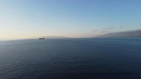 Cargo ship on the open sea Stock Photos