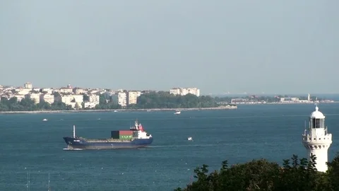 Cargo ship passes through the Bosphorus Strait Stock Footage 76486366