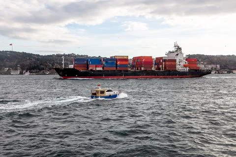 A cargo ship passes through the Bosphorus Strait in Turkey Stock Photos