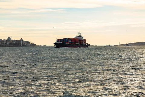 A cargo ship passes through the Bosphorus Strait in Turkey Stock Photos
