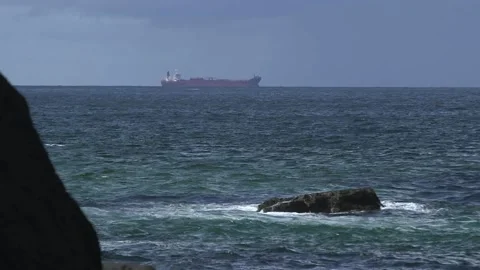 Cargo ship passing Cape Wrath Stock Footage 158190472