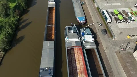 Cargo ship passing by Stock Footage 255409436