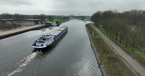Cargo ship passing by Stock Footage 265963993