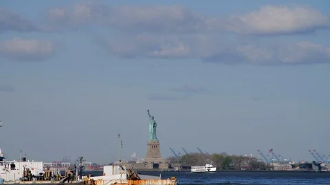 Cargo Ship Passing in front of the Statue of Liberty, New York City Stock Footage 116689197