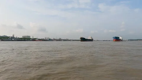 Cargo ship passing the river in the Chittagong port Bangladesh Stock Footage 273635912