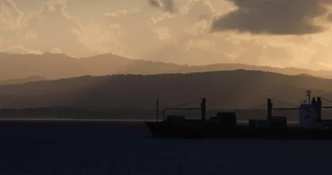 Cargo Ship Passing In Shadows Off Mexico Coast Stock Footage 215103476