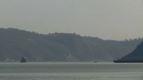 Cargo ship passing in time lapse Stock Footage 103307768