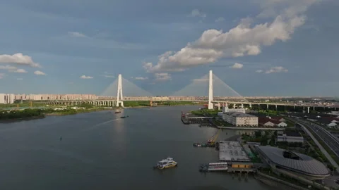 Cargo Ship Passing Under Modern Cable-Stayed Bridge on Huangpu River in Shanghai Stock Footage 312728135