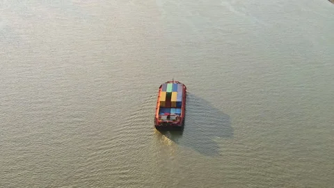 Cargo Ship Passing Under Modern Cable-Stayed Bridge on Huangpu River in Shanghai Stock Footage 312728931