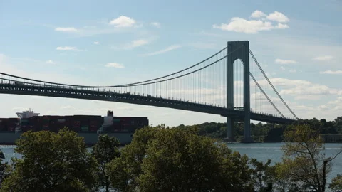 Cargo ship passing under Verrazano Bridge. Bay Ridge, Brooklyn. Stock Footage 220732220