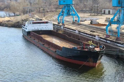 Cargo ship at the pier Stock Photos