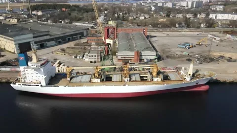 Cargo ship in port with crane Stock Footage 152607963