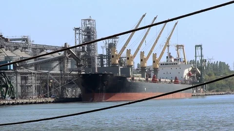 Cargo Ship is in the Port Pier at the Loading of Coal Stock Footage 120702511