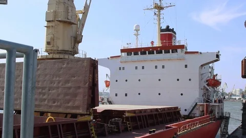 Cargo Ship is in the Port Pier at the Loading of Coal Stock Footage 120702549
