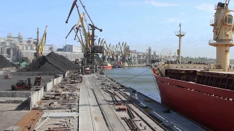 Cargo Ship is in the Port Pier at the Loading of Coal Stock Footage 120702567