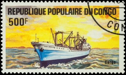 Cargo ship on postage stamp Stock Photos