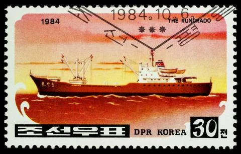 Cargo ship on postage stamp Stock Photos