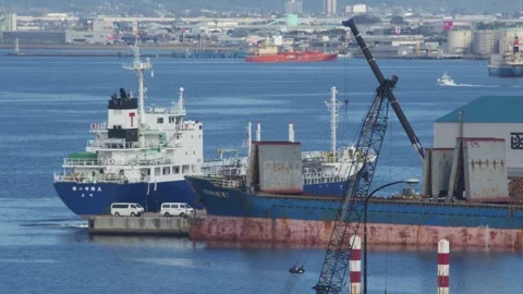 Cargo ship pulling into dock at a harbor, Hakodate, Japan, 2026.09.10. 動画素材 345432182
