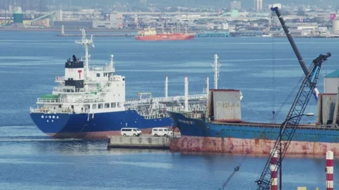 Cargo ship pulling into dock at a harbor, Hakodate, Japan, 2026.09.10. 動画素材 345434704