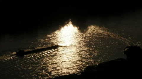 Cargo ship on the river after sunset. 4K and HD Stock Footage 52486443