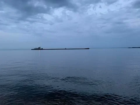 Cargo ship on a river Stock Photos