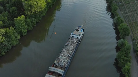 Cargo Ship on a river at sundown in between vineyards and forest Stock Footage 90663085