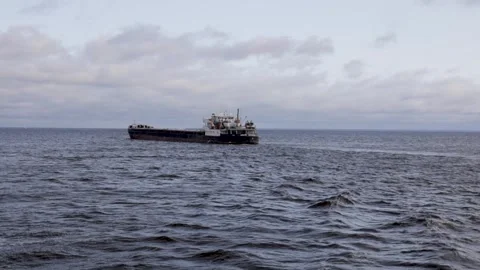 Cargo ship sailing along the Volga River Video stock 253401532
