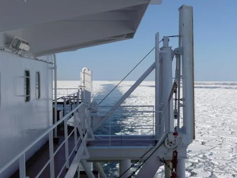 Cargo ship sailing in the Arctic ice Stock Photos