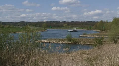 Cargo ship sailing in bend of river IJssel, The Netherlands. Stock Footage 21241080