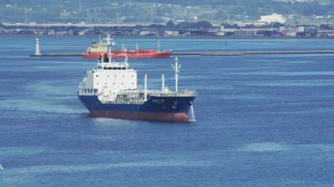 Cargo ship sailing on blue ocean waters, Hakodate, Japan, 2026.09.10. 動画素材 345431519