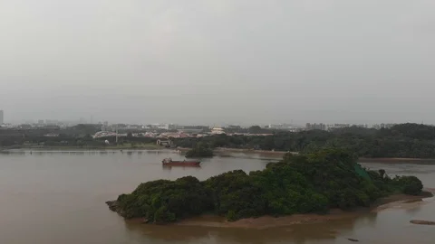 Cargo ship sailing on the river Stock Footage 114124806
