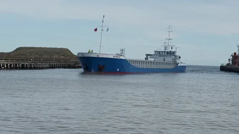 Cargo ship sailing up the river Video stock 235667226