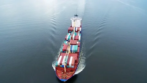 Cargo ship sailing in sea Stock Footage 82576671