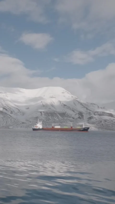 Cargo Ship Sailing Through Arctic Waters Near Svalbard, Norway Stock Footage 340036903